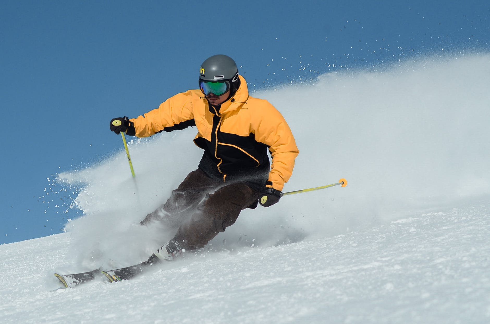 man skiing in snow (photo by mati mango on pexels.com